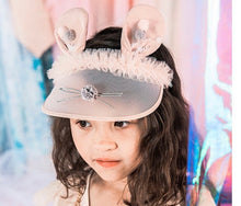 Ear Visor filled with Pom Poms
